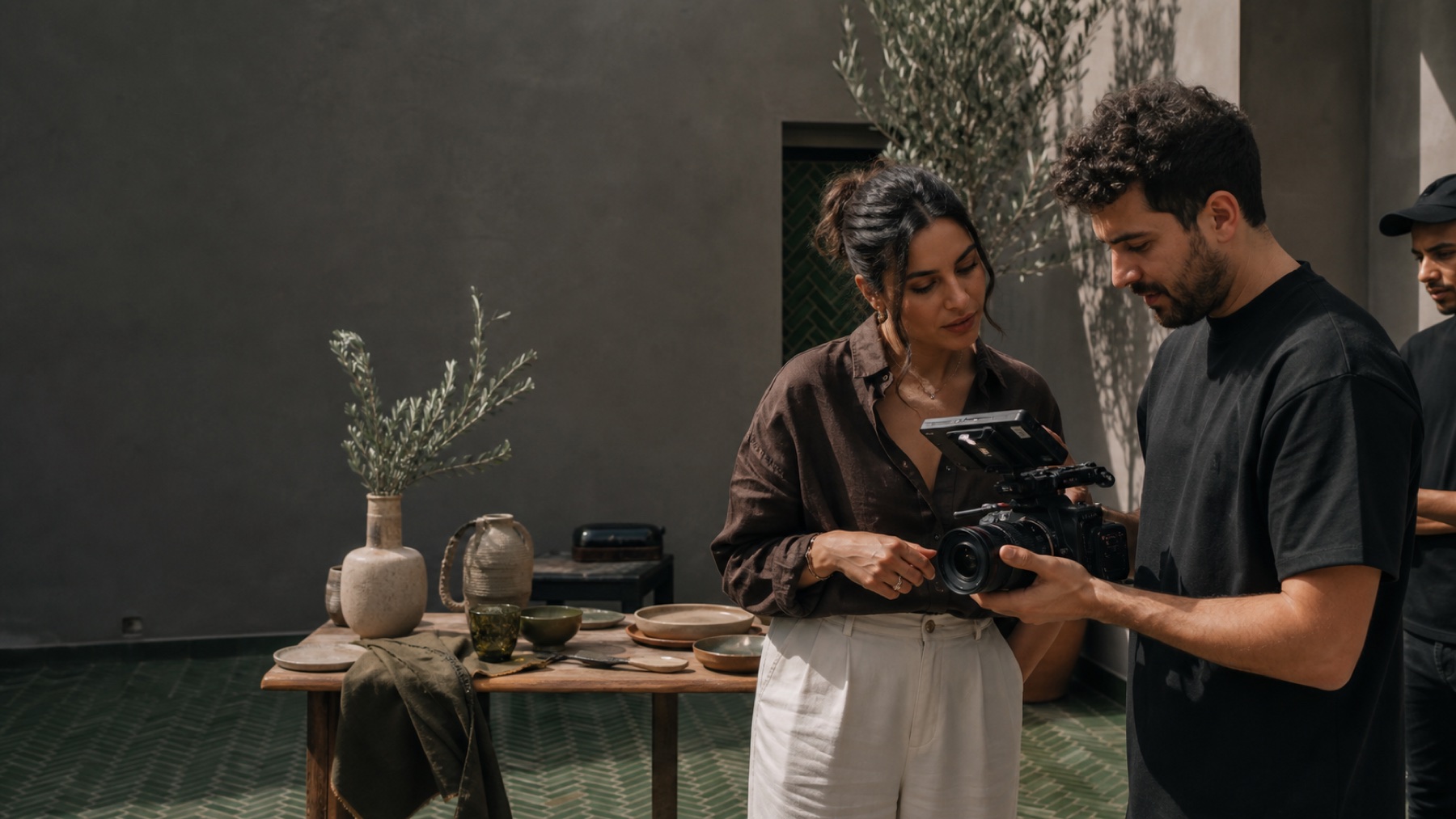 Moroccan beauty and design creator reviewing a studio production in Casablanca